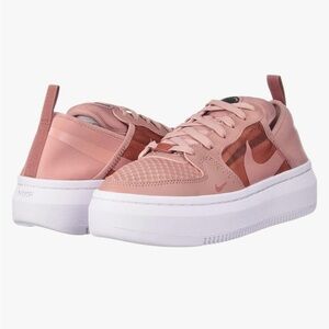 Nike Pink Sneakers with Minimalist Design and Lace-Up Closure
